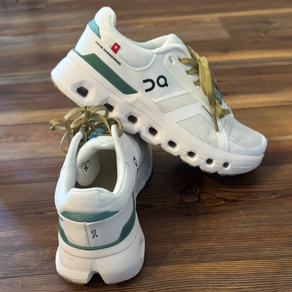 On Running Adult size 7.  White and Teal Sneakers. Worn once.